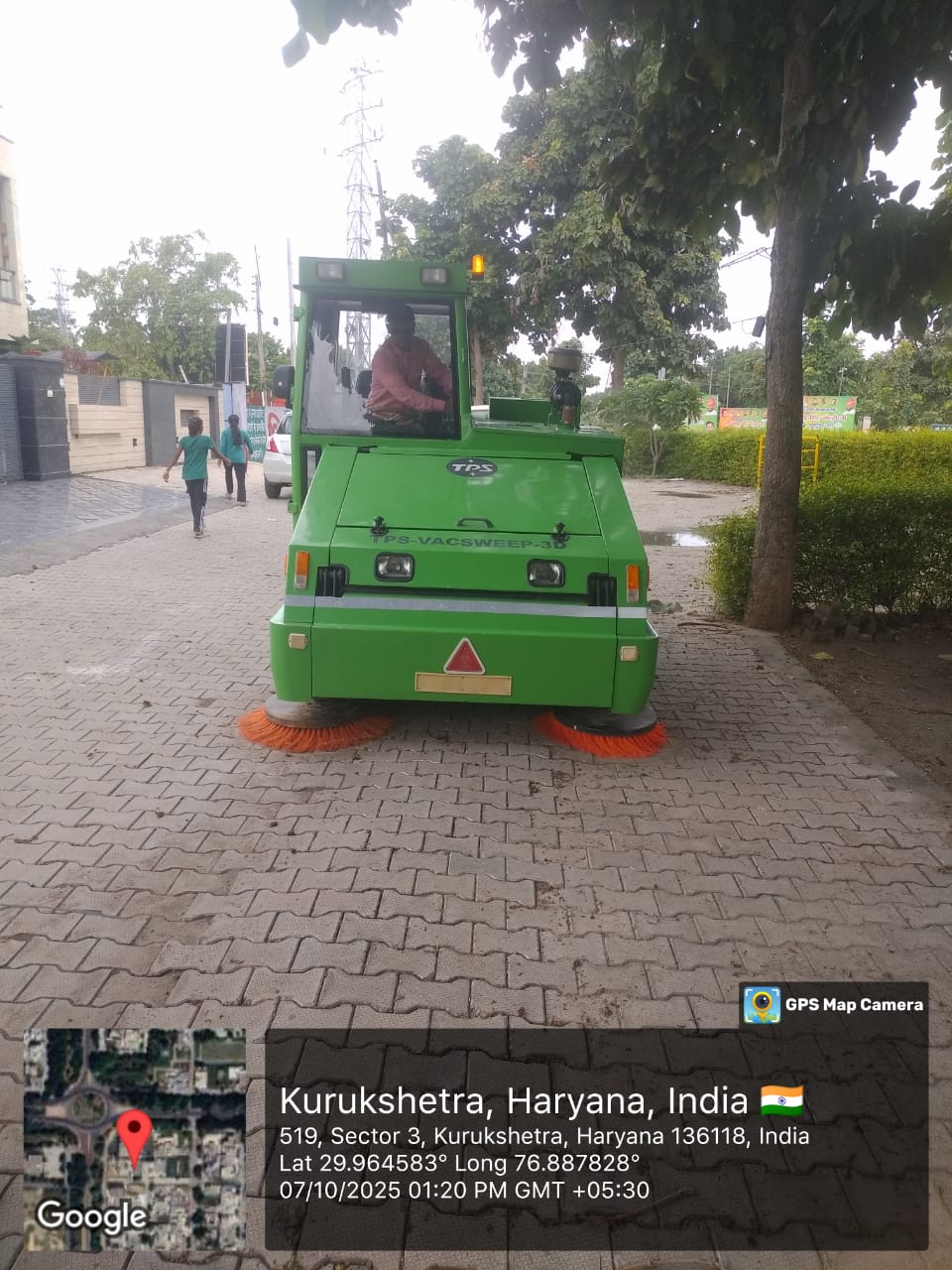 S.S. Solutions mechanised road sweeping machine cleaning a paved road in Sector 3, Kurukshetra